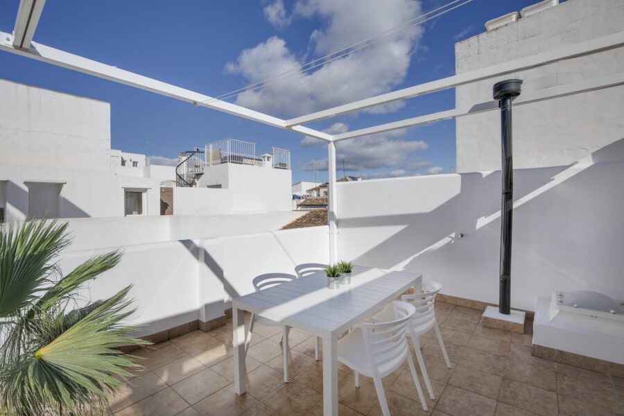 rooftop terrace with dining table